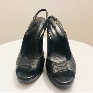 Cole Hana black snakeskin peep toe pumps